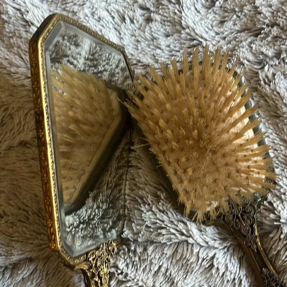 Antique mirror and brush set. Velvet with floral embordery design on back.